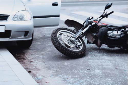 Concept of Smyrna motorcycle accident lawyer motorcycle hit by car