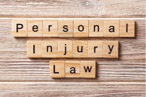 Smyrna personal injury lawyer concept wooden blocks spelling personal injury law