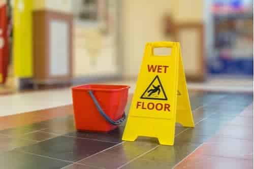 wet floor sign concept of Smyrna slip and fall lawyer