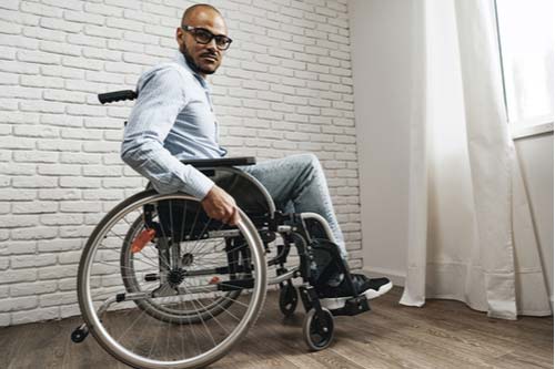 Young man in wheelchair concept of Smyrna spinal cord injury lawyer